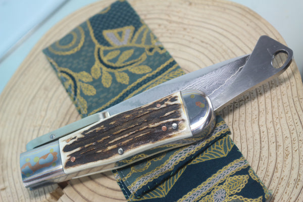 Fumio Inagaki FI-120 Marbles Folding Hunter Replica, VG-10 Damascus blade, Genuine Sambar Stag Handle with Rainbow Damascus Bolsters