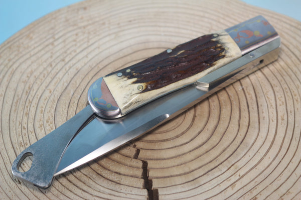 Fumio Inagaki FI-100 Marbles Folding Hunter Replica, Premium Hitachi ATS-34 blade, Rainbow Damascus Bolsters - japaneseknifedirect.mom