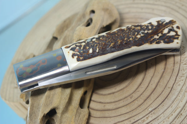 Fumio Inagaki FI-125 Jess Horn Folding Lock knife Replica, Premium Hitachi ATS-34 blade, Genuine Sambar Stag Handle with Rainbow Damascus Bolster - japaneseknifedirect.mom