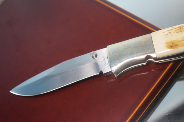 Fumio Inagaki FI-710 Blackjack MAMBA Folder replica, Mammoth Ivory Handle with Damascus Mokume-Gane  Bolster - japaneseknifedirect.mom