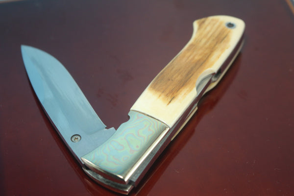 Fumio Inagaki FI-710 Blackjack MAMBA Folder replica, Mammoth Ivory Handle with Damascus Mokume-Gane  Bolster - japaneseknifedirect.mom