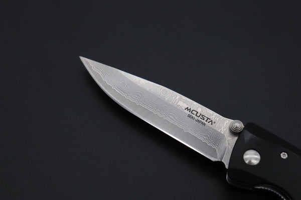 Mcusta Classic Wave Series MC-12D VG-10 Damascus blade with Black Linen Micarta handle