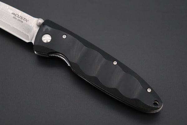 Mcusta Classic Wave Series MC-12D VG-10 Damascus blade with Black Linen Micarta handle
