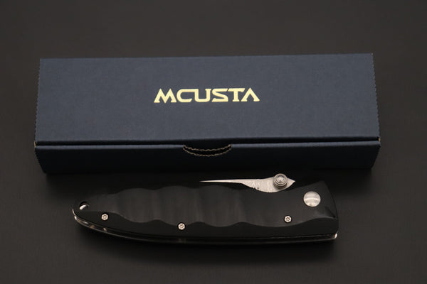 Mcusta Classic Wave Series MC-12D VG-10 Damascus blade with Black Linen Micarta handle