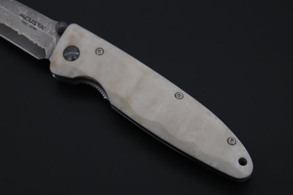 Mcusta Classic Wave Series MC-19D VG-10 Damascus blade with Dupont Corian handle - japaneseknifedirect.mom