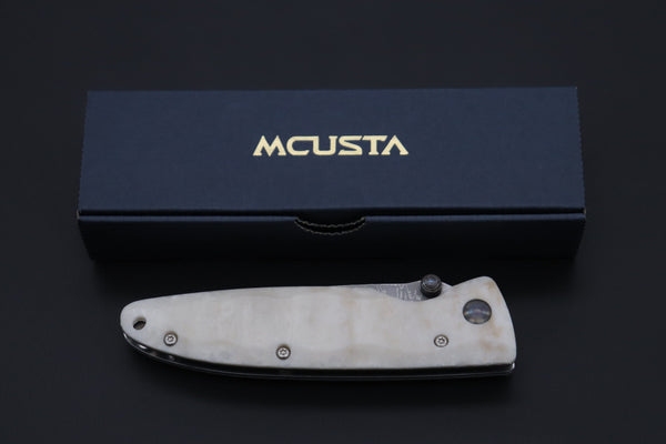 Mcusta Classic Wave Series MC-19D VG-10 Damascus blade with Dupont Corian handle - japaneseknifedirect.mom