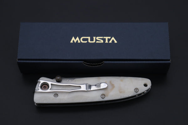 Mcusta Classic Wave Series MC-19D VG-10 Damascus blade with Dupont Corian handle - japaneseknifedirect.mom