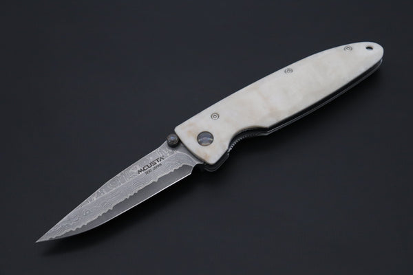 Mcusta Classic Wave Series MC-19D VG-10 Damascus blade with Dupont Corian handle - japaneseknifedirect.mom