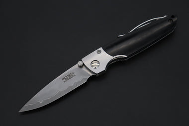 Mcusta SHINRA 森羅 Premium Series MC-144G TEANA SPG-2 San Mai (Black Pakkawood handle) - japaneseknifedirect.mom