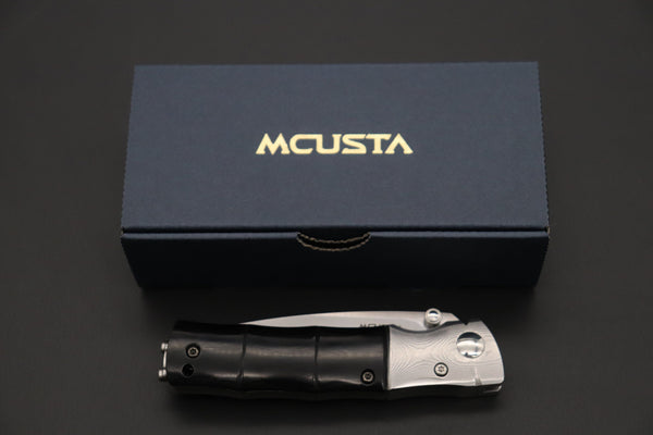 Mcusta SHINRA 森羅 Premium Series MC-146G BAMBOO SPG-2 San Mai (Black Pakkawood handle) - japaneseknifedirect.mom
