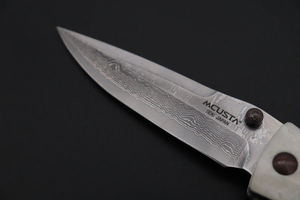 Mcusta Tactility Elite Folder Series MC-126D VG-10 Damascus Blade with Dupont White Corian Handle - japaneseknifedirect.mom