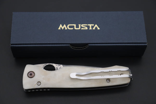 Mcusta Tactility Elite Folder Series MC-126G SPG-2 San Mai blade with Dupont Corian handle - japaneseknifedirect.mom