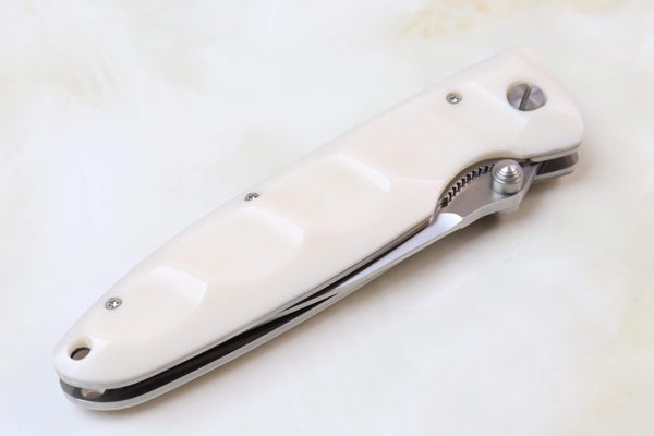 Mcusta Classic Wave Series MC-25 VG-10 blade with Dupont White Cream Corian handle - japaneseknifedirect.mom