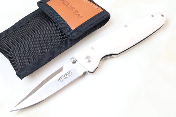 Mcusta Classic Wave Series MC-25 VG-10 blade with Dupont White Cream Corian handle - japaneseknifedirect.mom