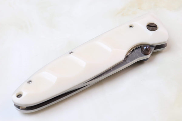 Mcusta Classic Wave Series MC-25D VG-10 Damascus blade with Dupont White Cream Corian Handle - japaneseknifedirect.mom