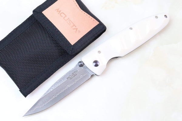 Mcusta Classic Wave Series MC-25D VG-10 Damascus blade with Dupont White Cream Corian Handle - japaneseknifedirect.mom